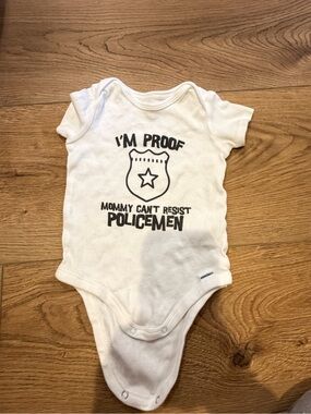 Gerber White Baby One-Piece with Black Police Badge Graphic